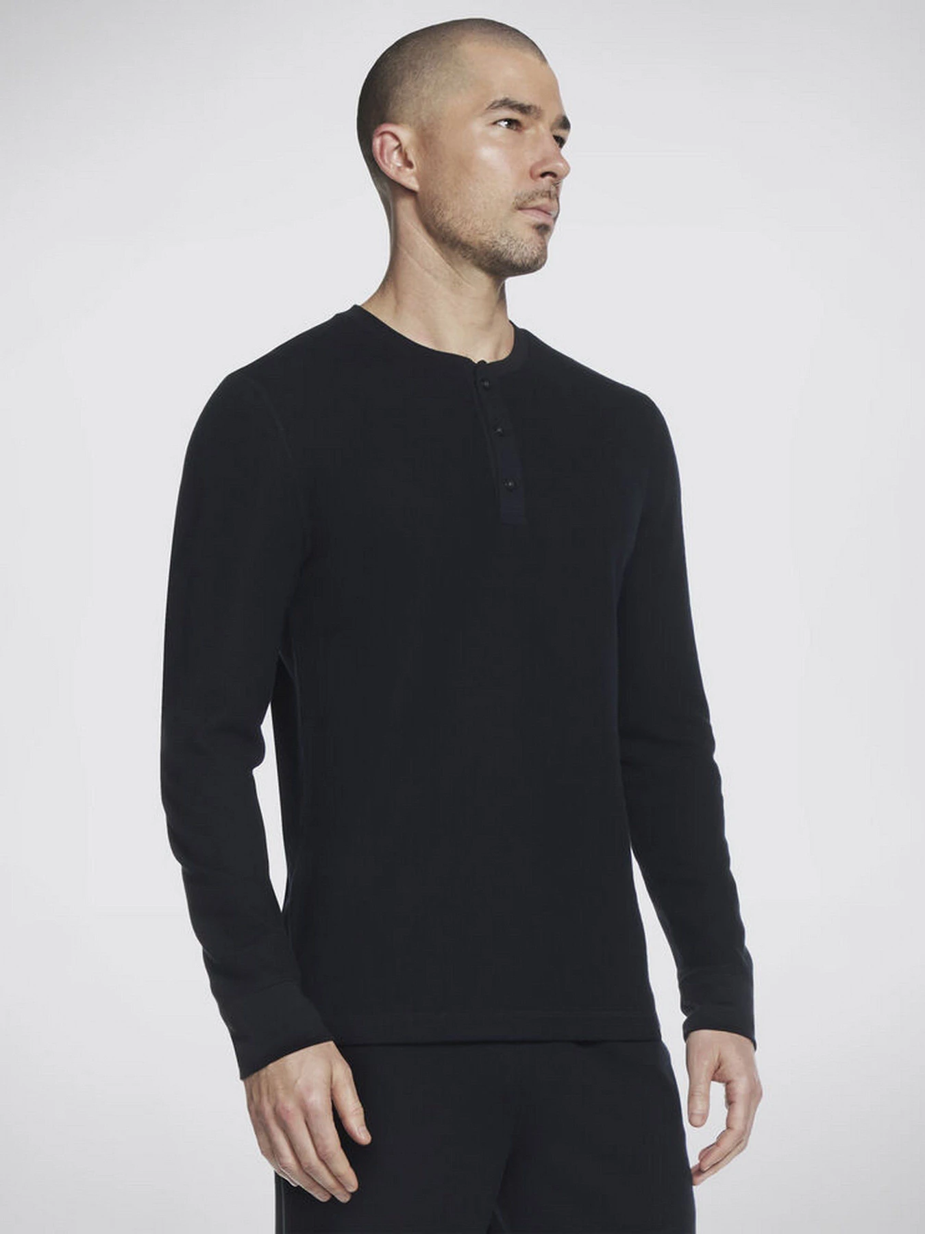 Худі та світшоти Skechers GO Knit Waffle Henley модель LT18 BLK Худі та світшоти Skechers GO Knit Waffle Henley модель LT18 BLK Фото