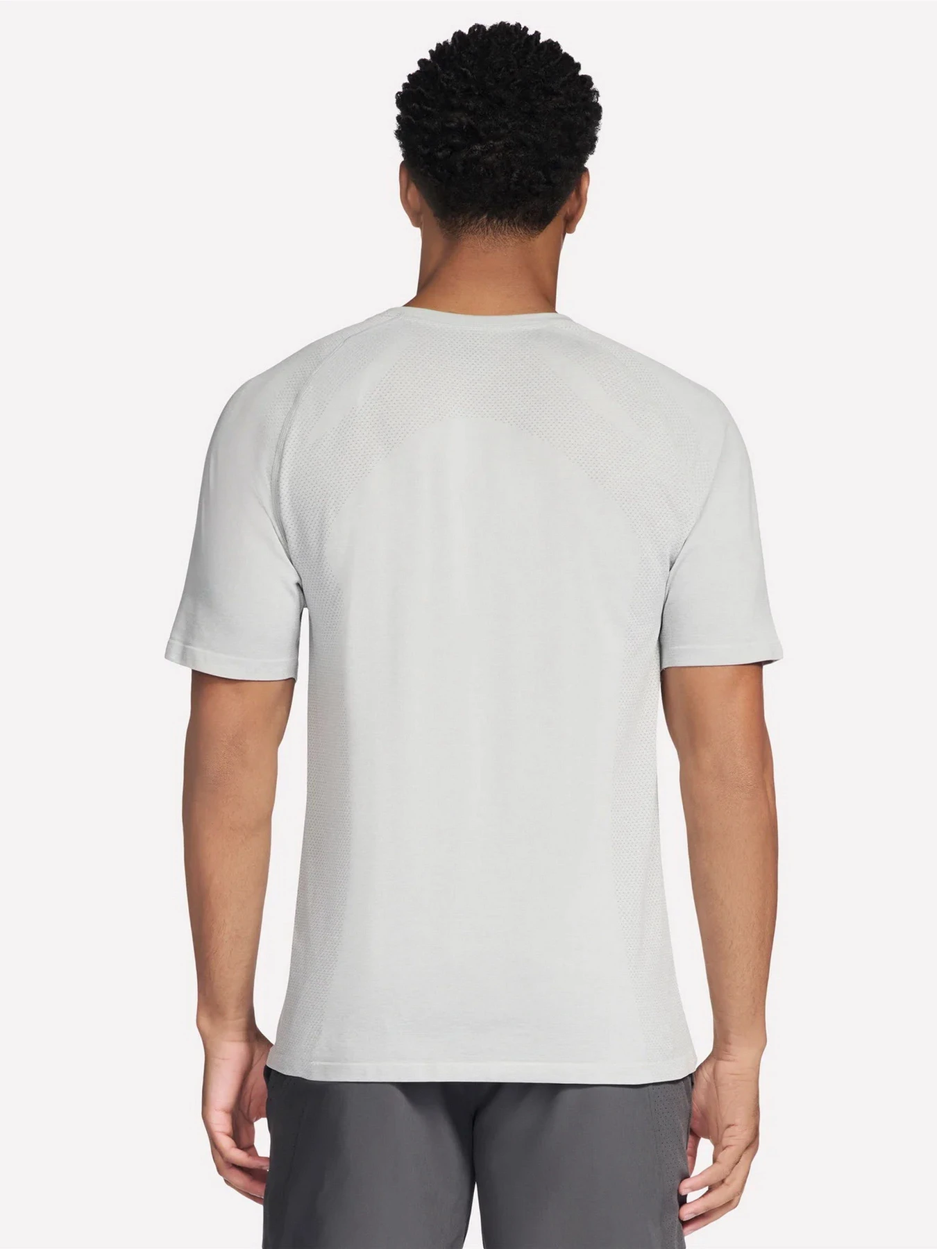 Футболки и поло Skechers RAGLAN SEAMLESS TEE модель TS259 LGY Футболки и поло Skechers RAGLAN SEAMLESS TEE модель TS259 LGY Фото