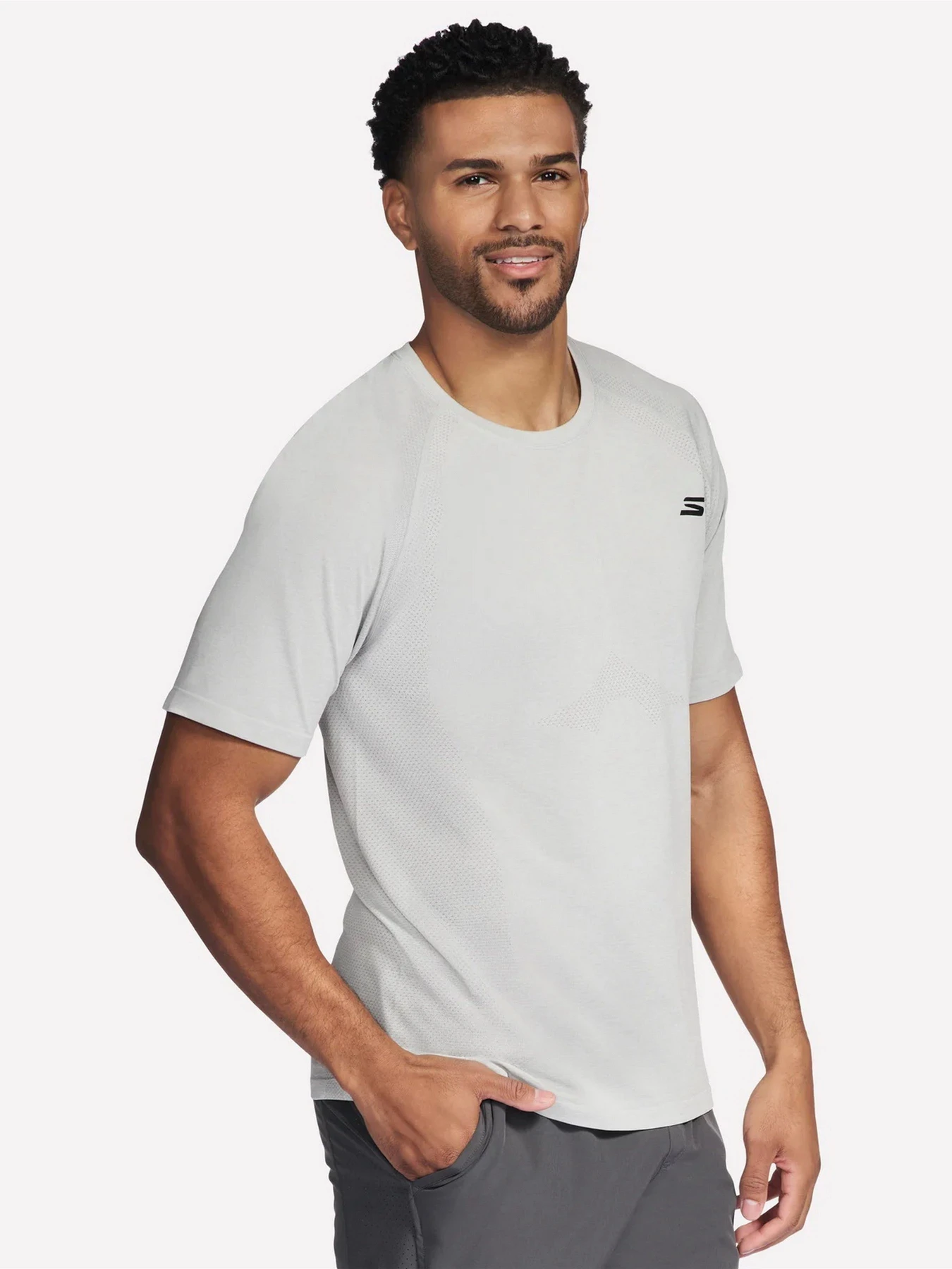 Футболки и поло Skechers RAGLAN SEAMLESS TEE модель TS259 LGY Футболки и поло Skechers RAGLAN SEAMLESS TEE модель TS259 LGY Фото