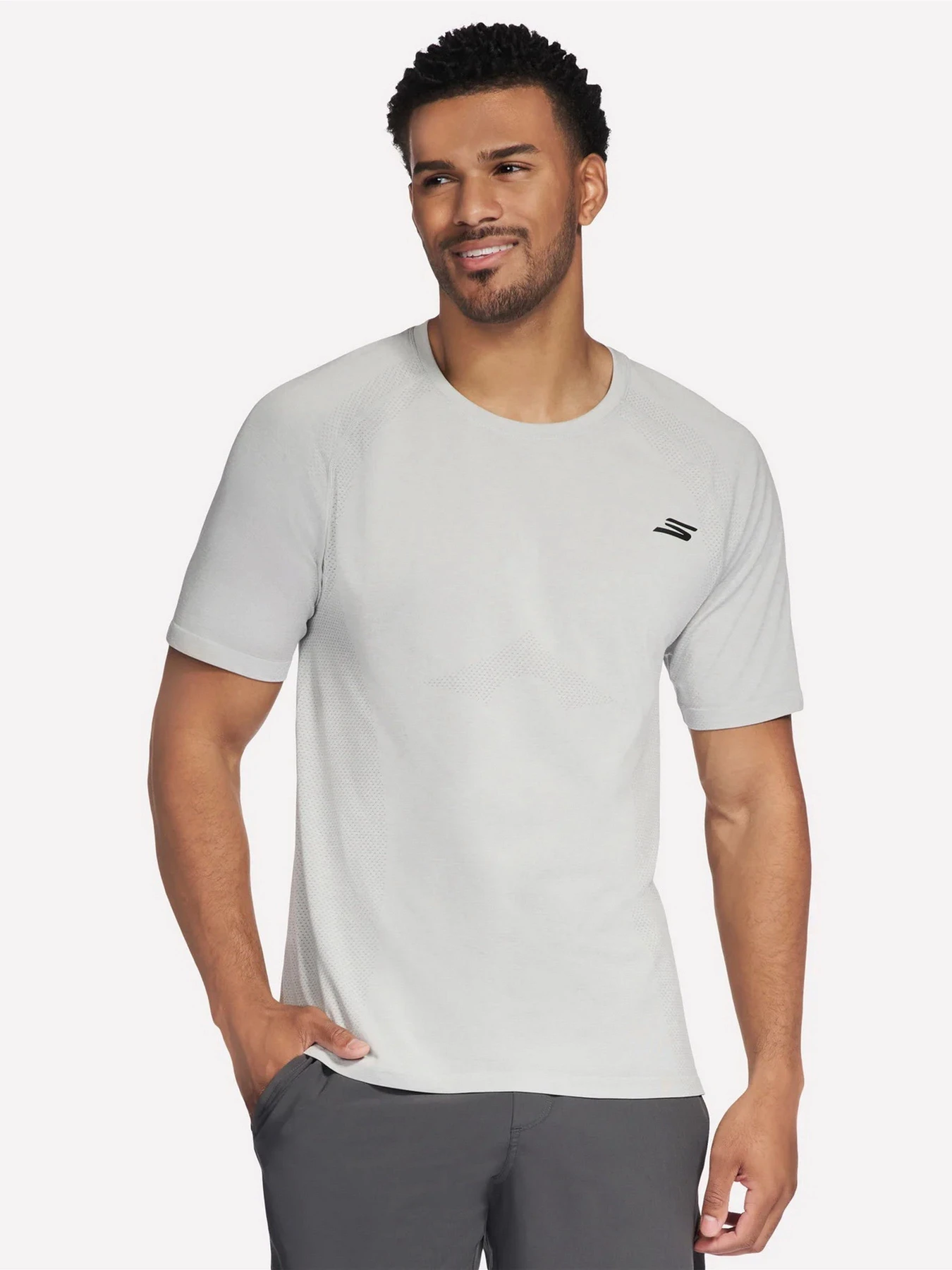 Футболки и поло Skechers RAGLAN SEAMLESS TEE модель TS259 LGY Футболки и поло Skechers RAGLAN SEAMLESS TEE модель TS259 LGY Фото