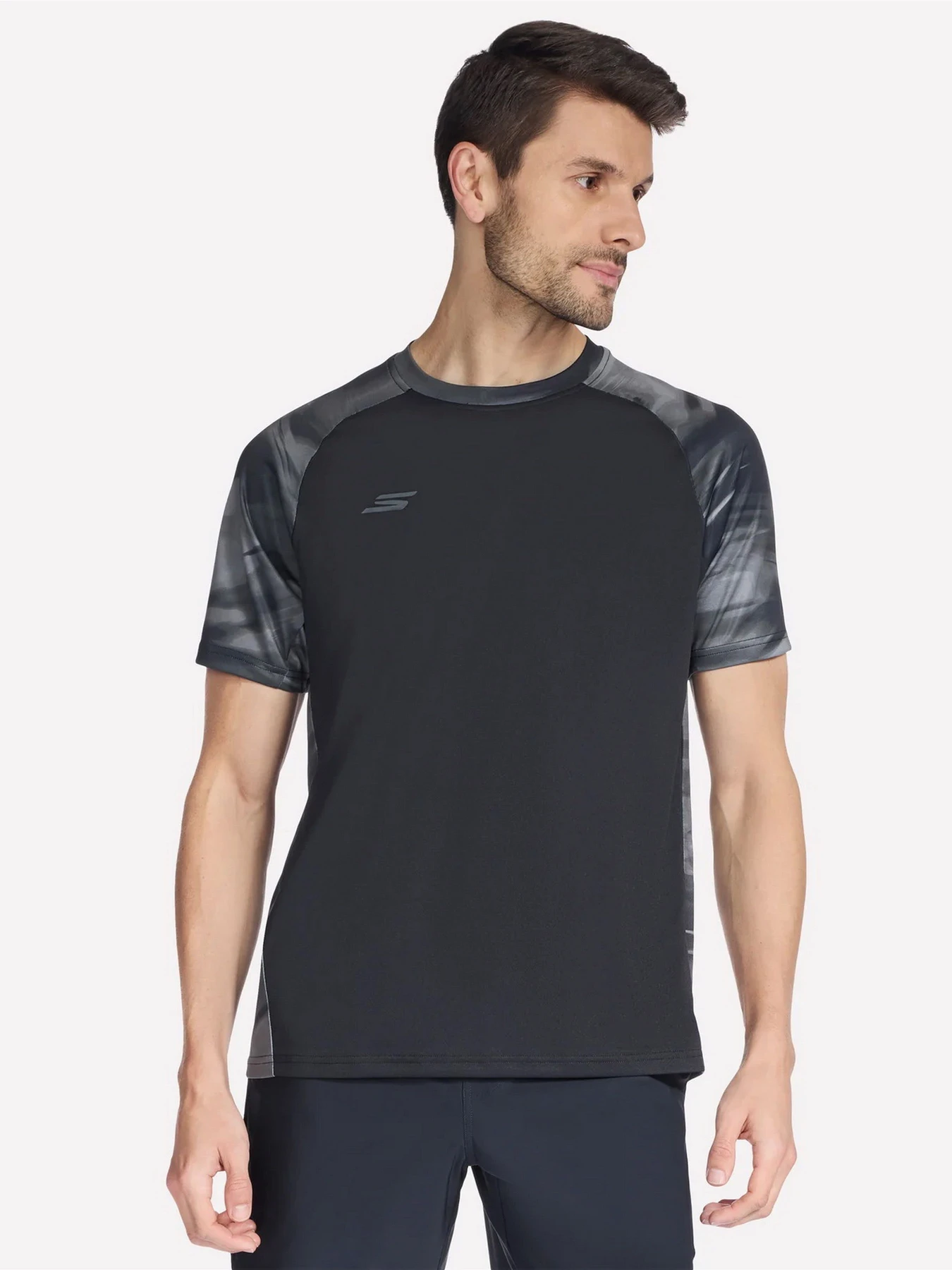 Футболки і поло Skechers HK GODRI CHARGE DRIFT TEE модель TS300HK DKCC Футболки і поло Skechers HK GODRI CHARGE DRIFT TEE модель TS300HK DKCC Фото