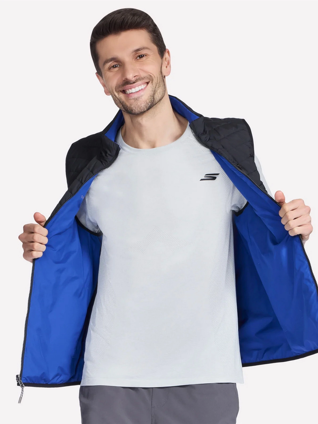 Куртки та дублянки Skechers GOSHIELD ALTITUDE REVERSIBLE V модель JA140 BKRY Куртки та дублянки Skechers GOSHIELD ALTITUDE REVERSIBLE V модель JA140 BKRY Фото