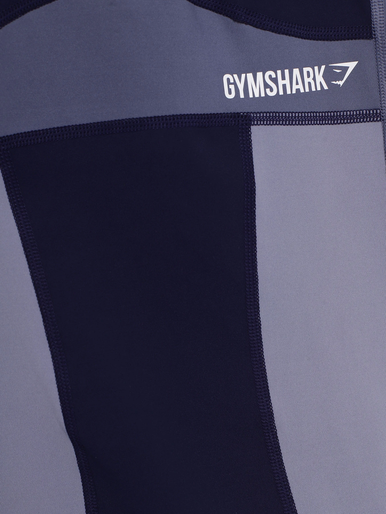 Футболки і поло Gymshark модель GLVT1869_т.фіолетовий комб. Футболки і поло Gymshark модель GLVT1869_т.фіолетовий комб. Фото