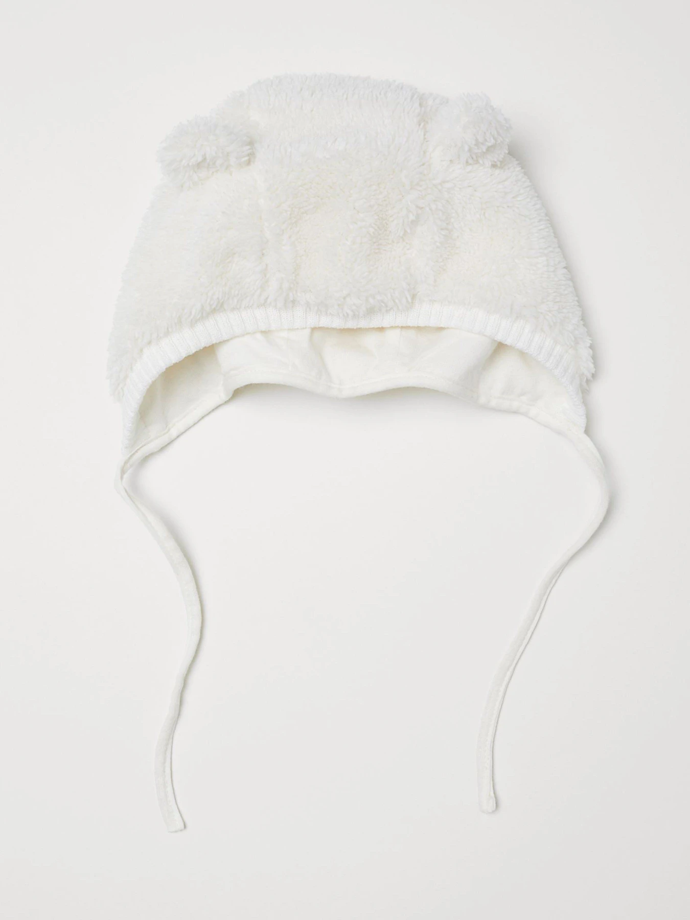 Шапки и кепки H&M модель 0655739_білий Шапки и кепки H&M модель 0655739_білий Фото