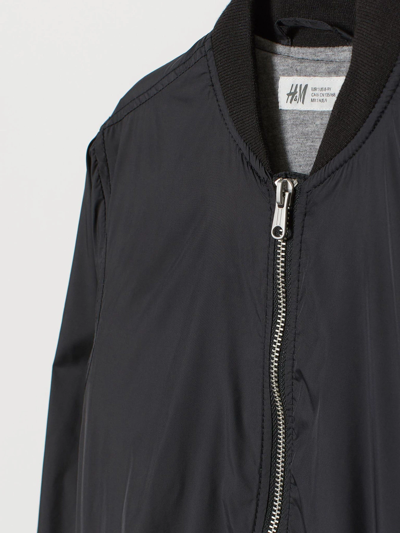 Куртки та дублянки H&M модель 0803565_чорний Куртки та дублянки H&M модель 0803565_чорний Фото