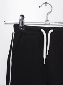 Брюки H&M модель 0743905_чорний з білим Фото