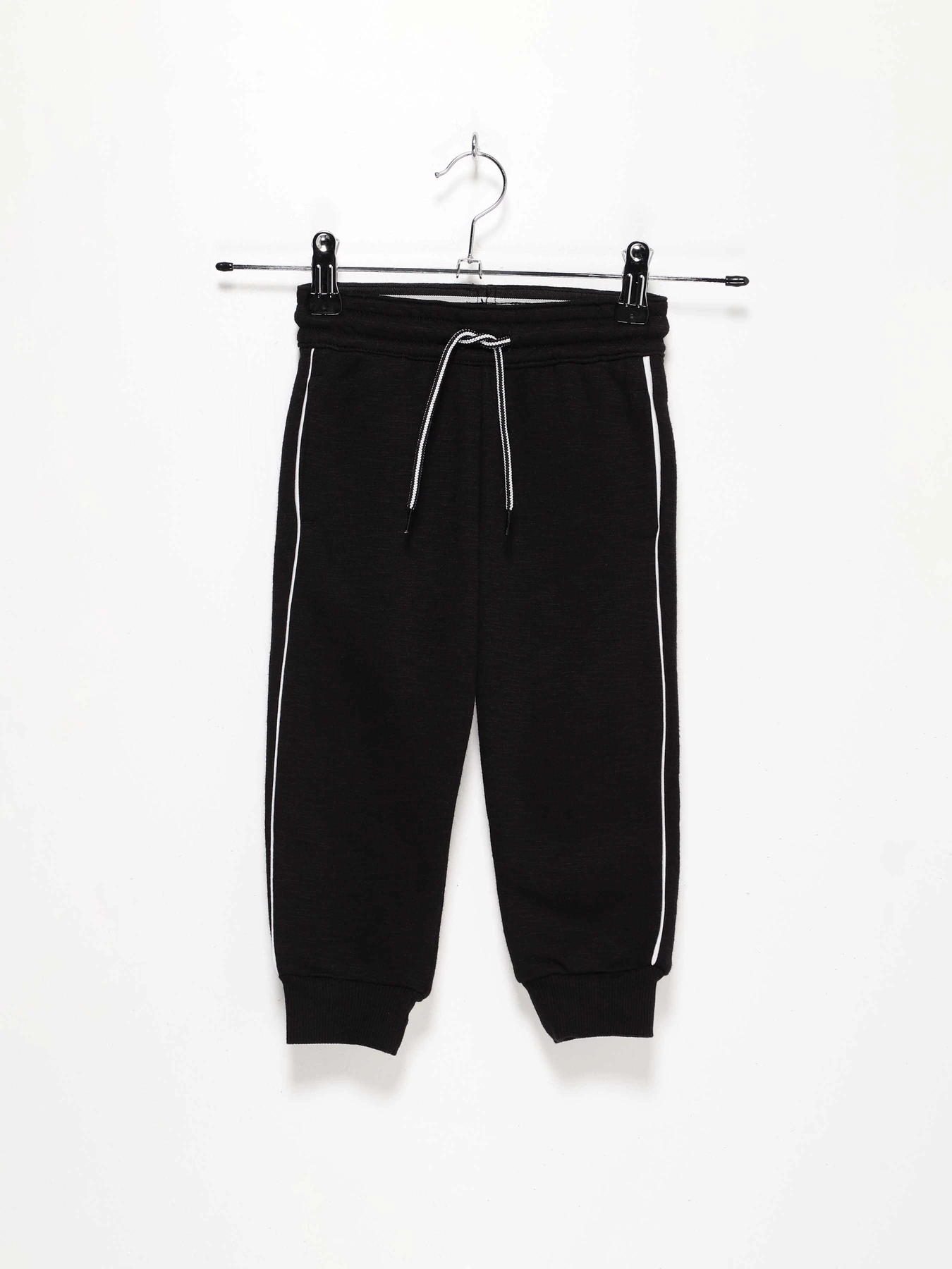 Брюки H&M модель 0754598_чорний з білим Фото