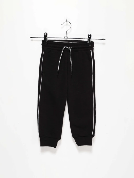 Брюки H&M модель 0754598_чорний з білим Фото