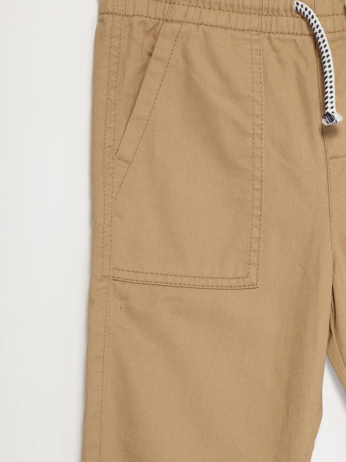Брюки H&M модель 0875084_бежевий Фото