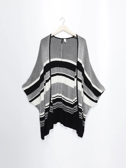 Свитры и кардиганы H&M модель 0409933_чорний з білим Фото
