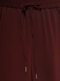 Брюки H&M модель 0429447_бордовий Фото