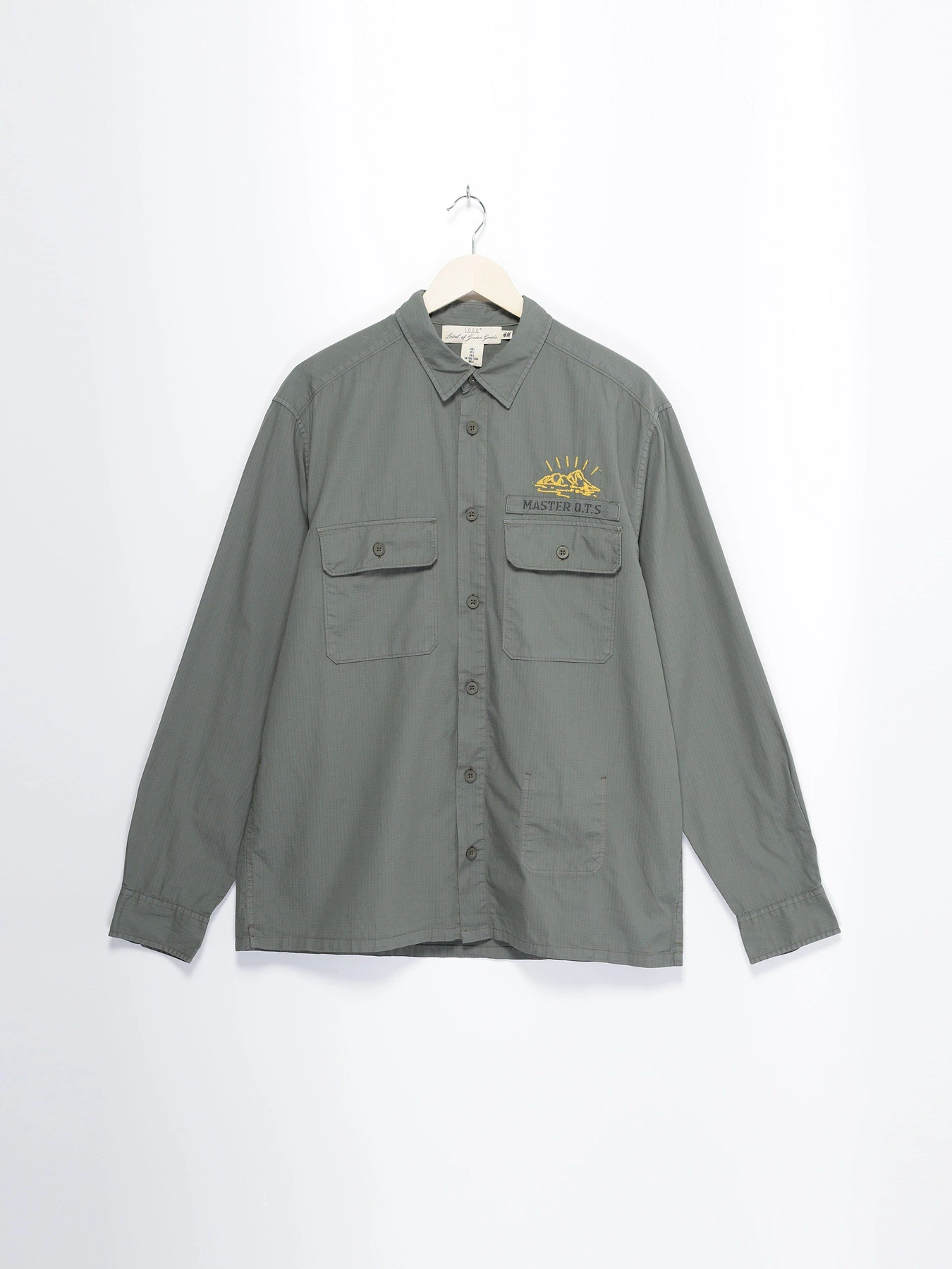 Рубашки H&M модель 0616819_хакі Рубашки H&M модель 0616819_хакі Фото