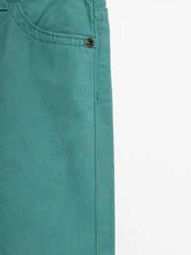 Брюки H&M модель 0692840_бірюзовий Фото