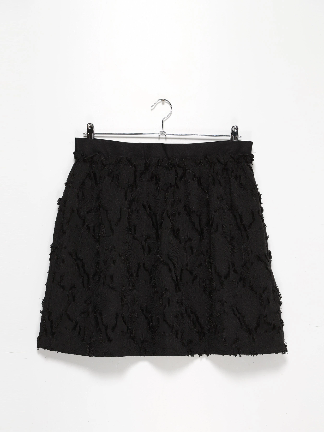 Юбки H&M модель 0520132_чорний Фото