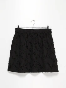 Юбки H&M модель 0520132_чорний Фото