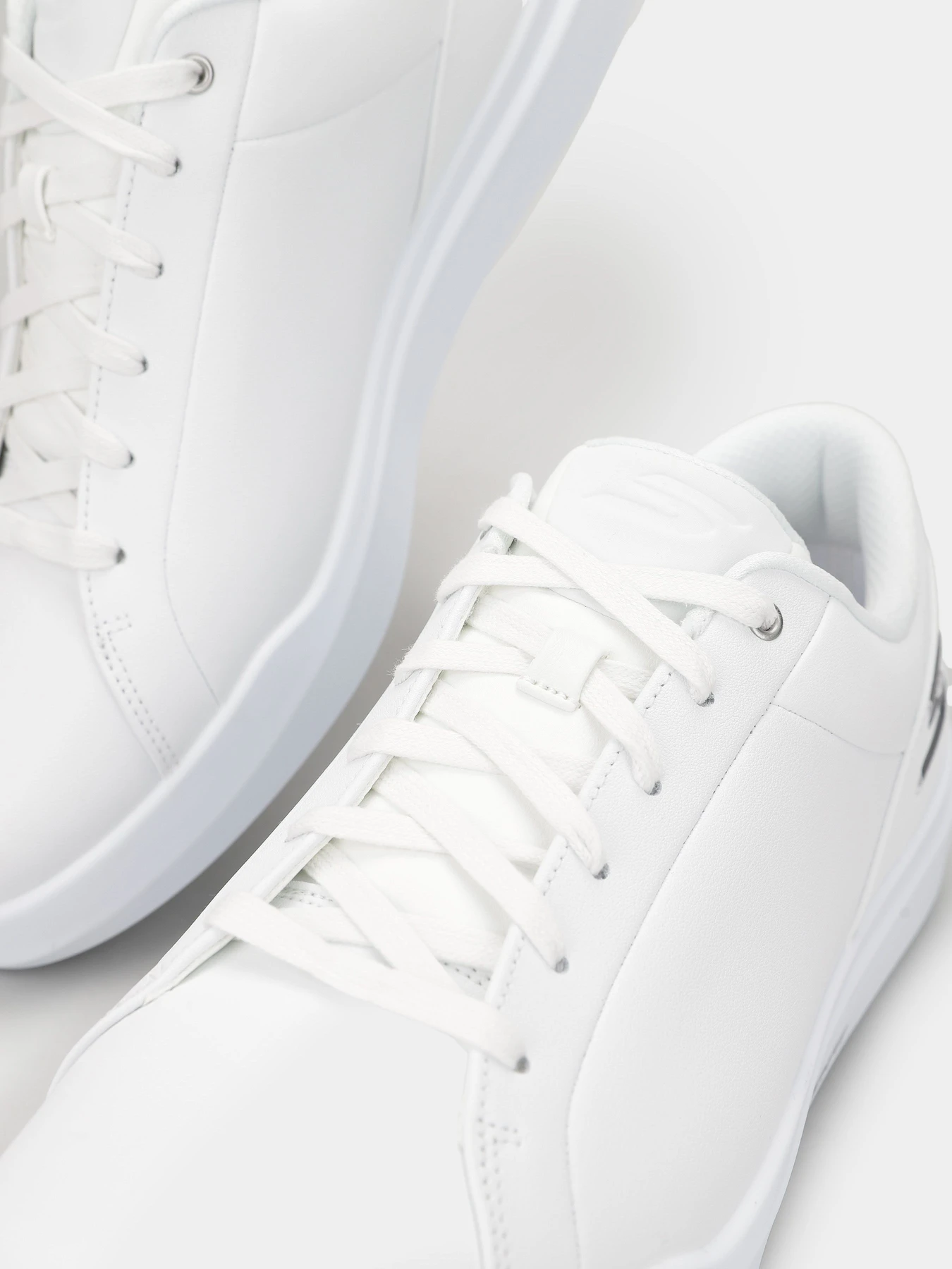 Кросівки Skechers Relaxed Fit: GO Golf Drive 6 модель 214128 WHT Кросівки Skechers Relaxed Fit: GO Golf Drive 6 модель 214128 WHT Фото