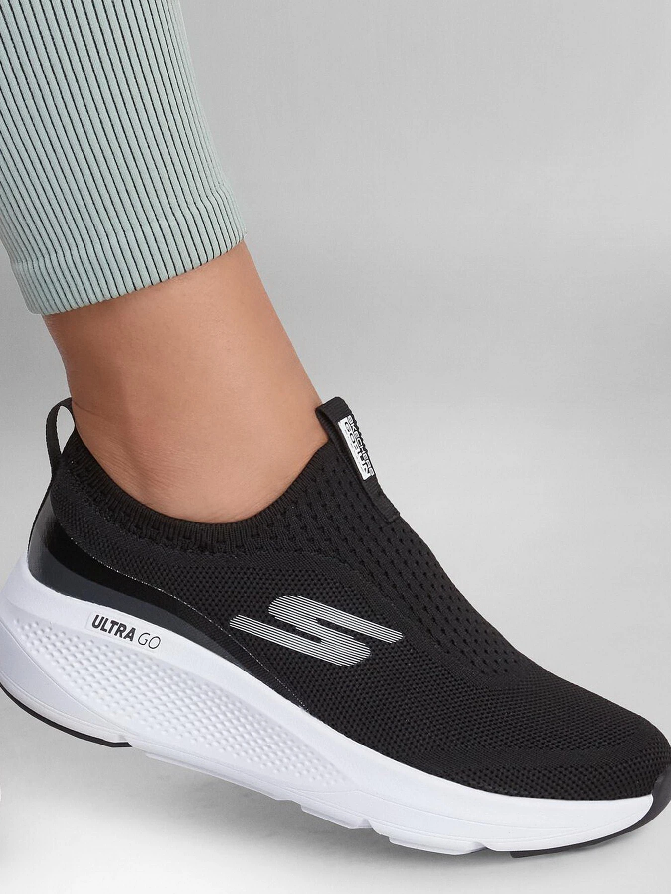 Слипоны и мокасины Skechers GOrun Elevate - Hot Streak модель 128320 BKW Слипоны и мокасины Skechers GOrun Elevate - Hot Streak модель 128320 BKW Фото