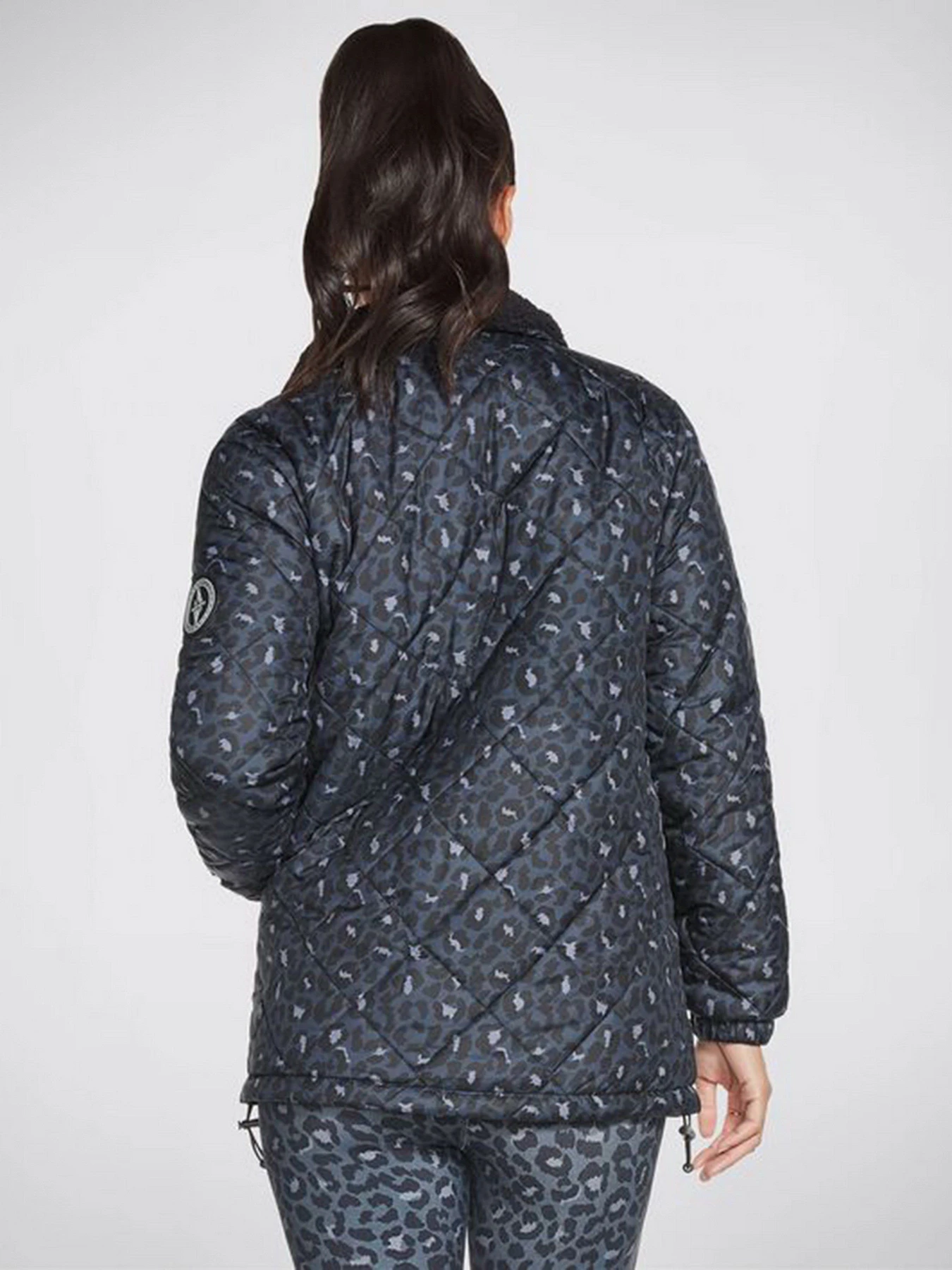 Куртки и дубленки Skechers GOwalk Wear Midnight Puffer Jacket модель W3JA251 BKNV Фото