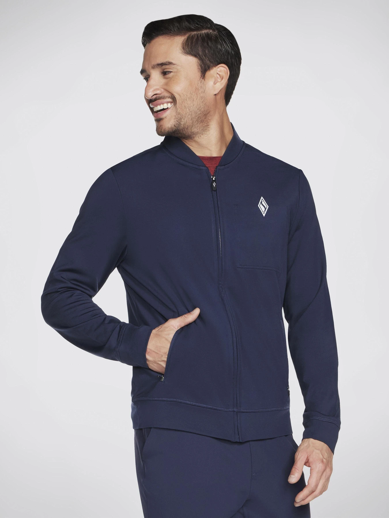 Худи и свитшоты Skechers Hoodless ULTRA GO модель M3JA212 DKNV Фото