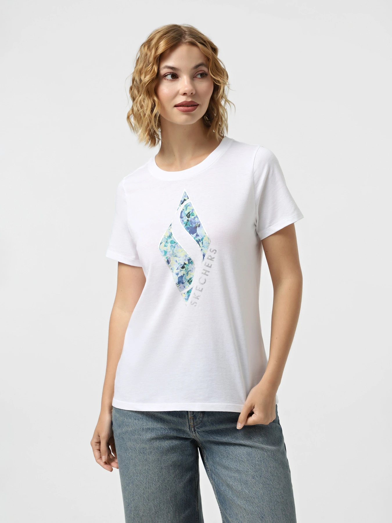 Футболки і поло Skechers FLORAL DIAMOND CLASSIC CREW TE модель TS181 WHT Футболки і поло Skechers FLORAL DIAMOND CLASSIC CREW TE модель TS181 WHT Фото