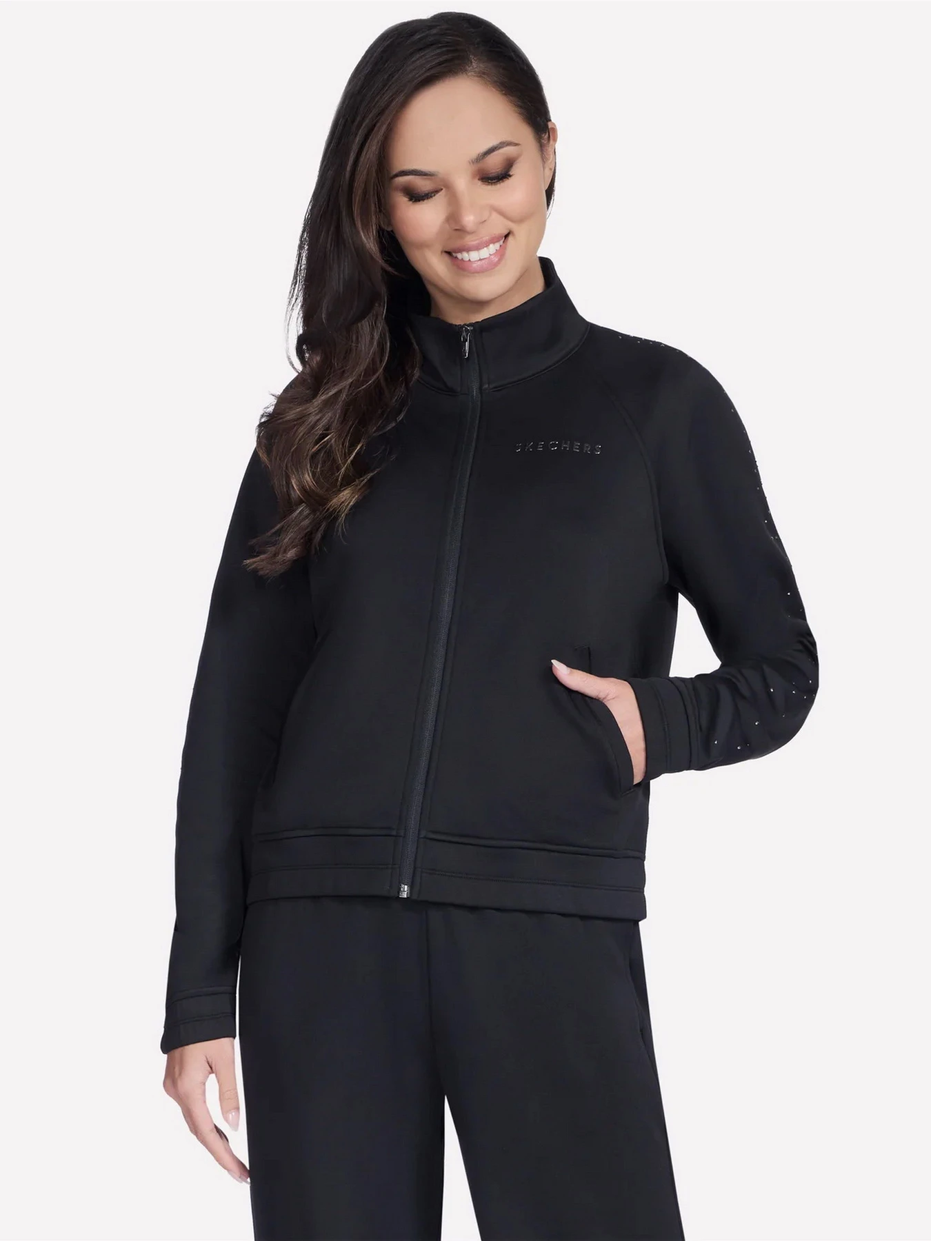 Куртки та дублянки Skechers SKECHTECH SHINE TRACK JACKET модель JA290 BLK Куртки та дублянки Skechers SKECHTECH SHINE TRACK JACKET модель JA290 BLK Фото