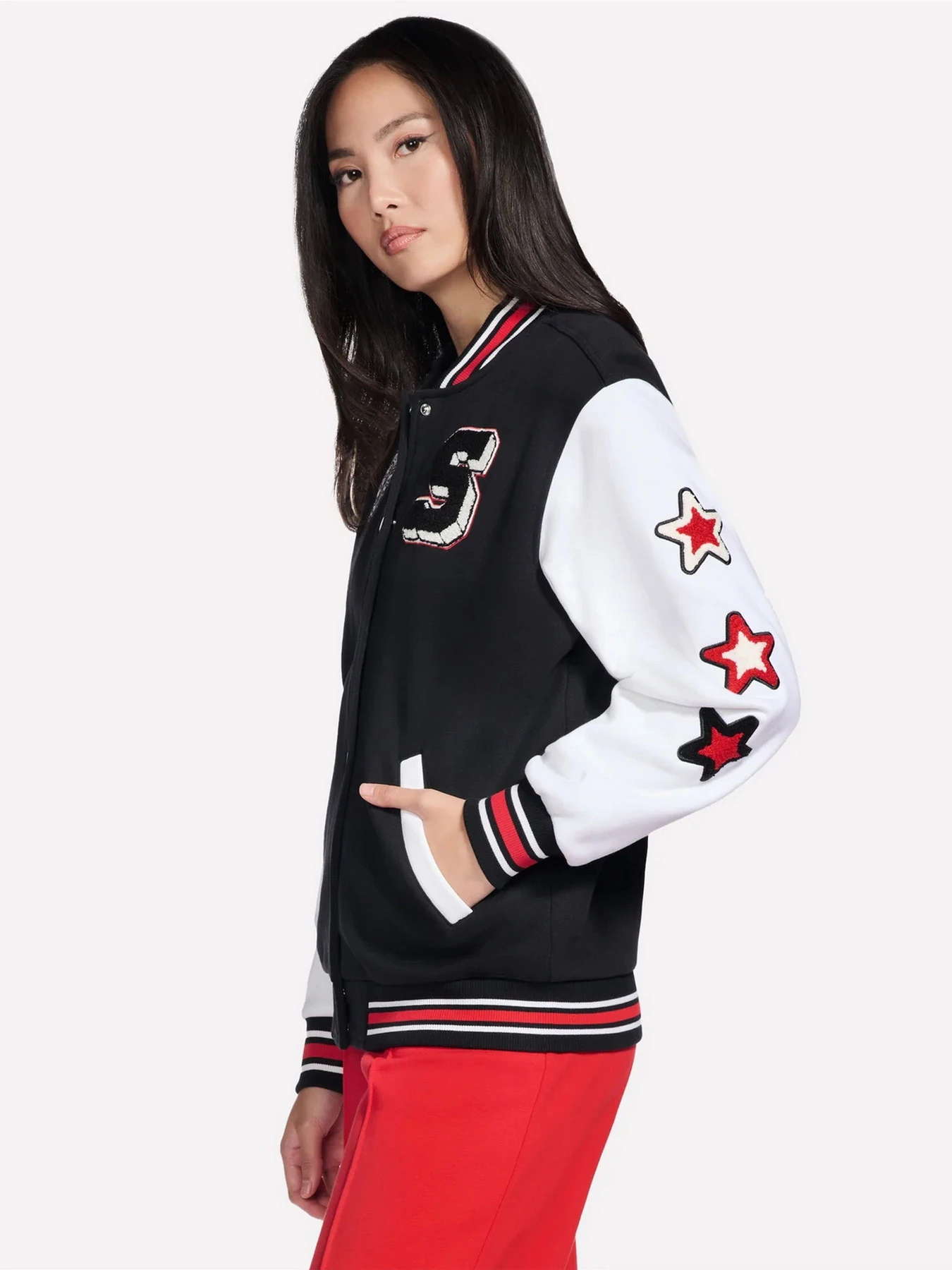 Куртки и дубленки Skechers SKECHERS CLASSIC VARSITY JACKE модель JA291 BLK Фото