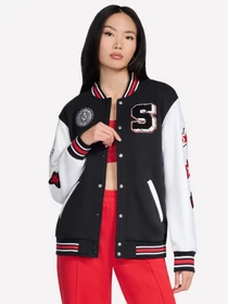 Куртки и дубленки Skechers SKECHERS CLASSIC VARSITY JACKE модель JA291 BLK Фото