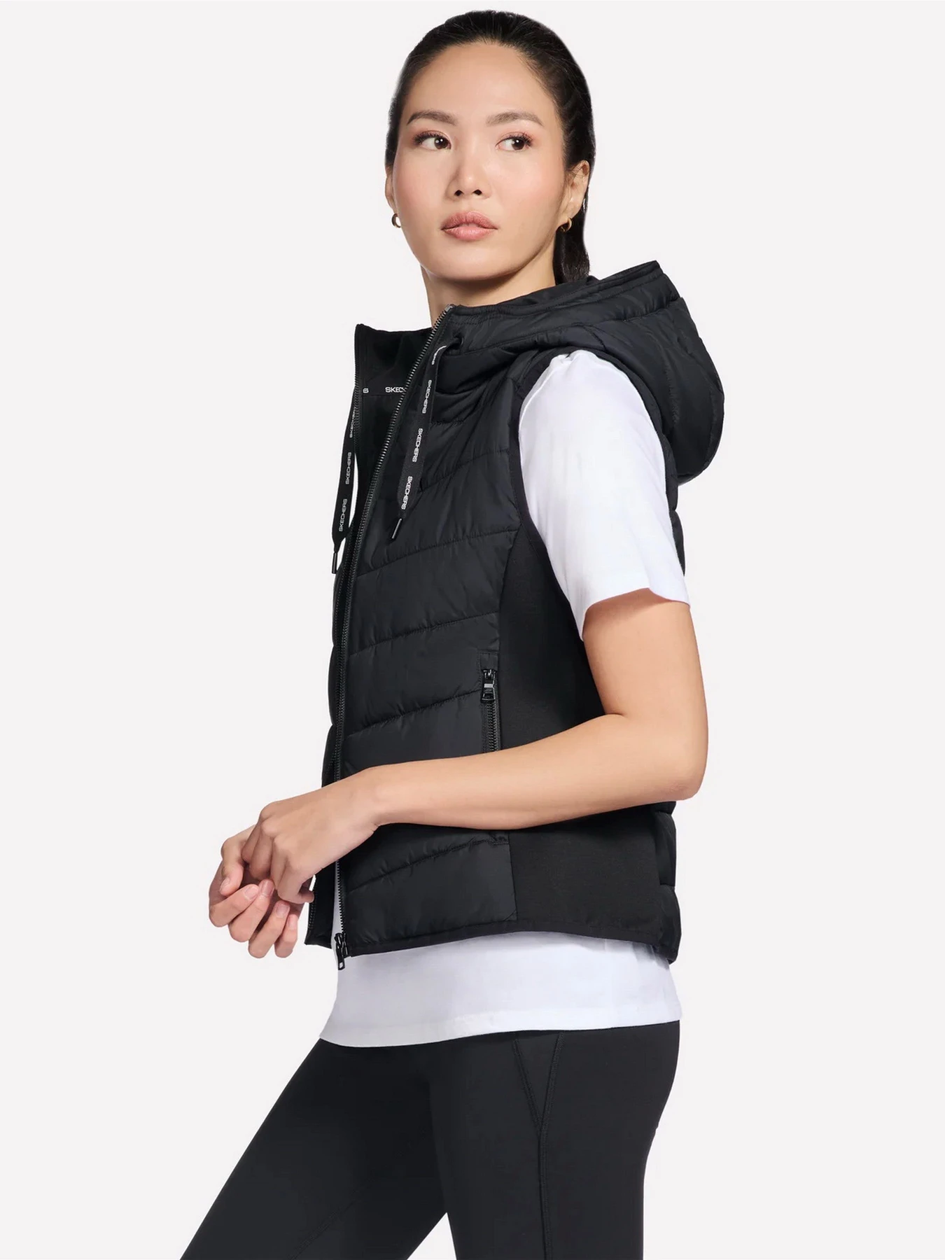 Куртки и дубленки Skechers SKECHERS PERFORMANCE ELITE HOO модель JA212 BLK Куртки и дубленки Skechers SKECHERS PERFORMANCE ELITE HOO модель JA212 BLK Фото