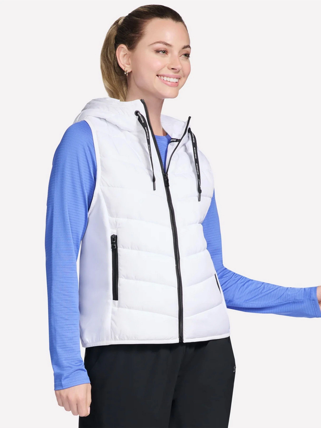 Куртки и дубленки Skechers SKECHERS PERFORMANCE ELITE HOO модель JA212 WHT Куртки и дубленки Skechers SKECHERS PERFORMANCE ELITE HOO модель JA212 WHT Фото