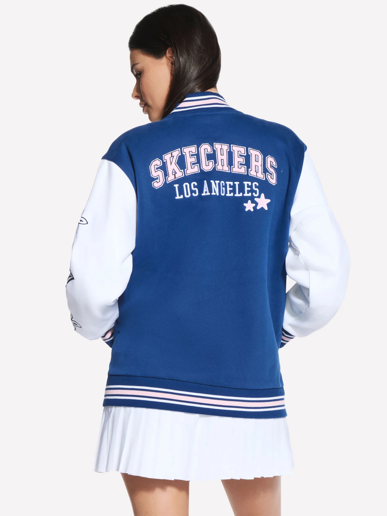 Куртки та дублянки Skechers SKECHERS STREET VARSITY JACKET модель JA351 PKBL Куртки та дублянки Skechers SKECHERS STREET VARSITY JACKET модель JA351 PKBL Фото