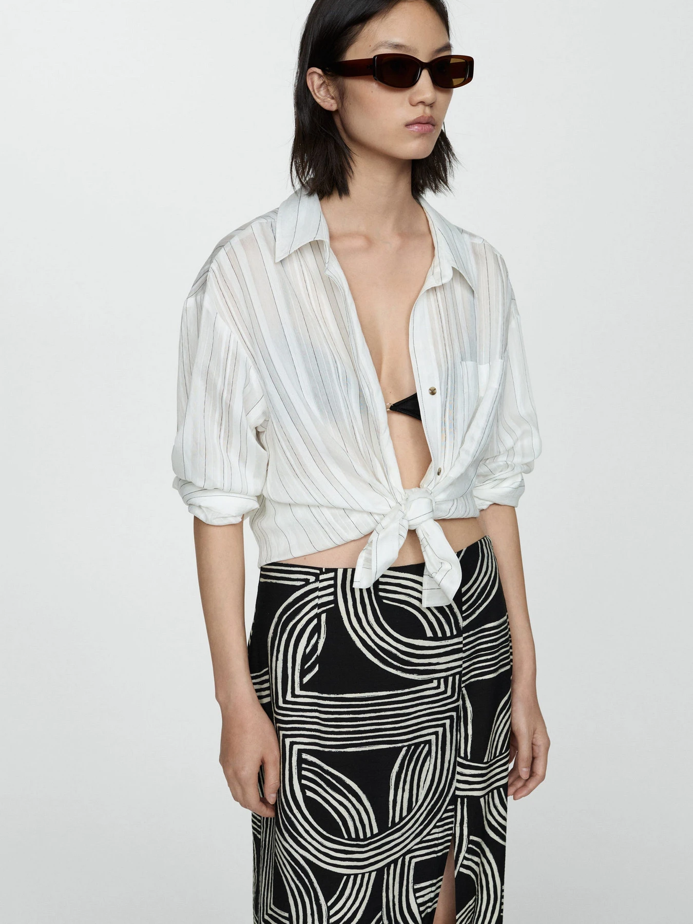 Юбки MANGO Hawai модель 77040349_99 Юбки MANGO Hawai модель 77040349_99 Фото