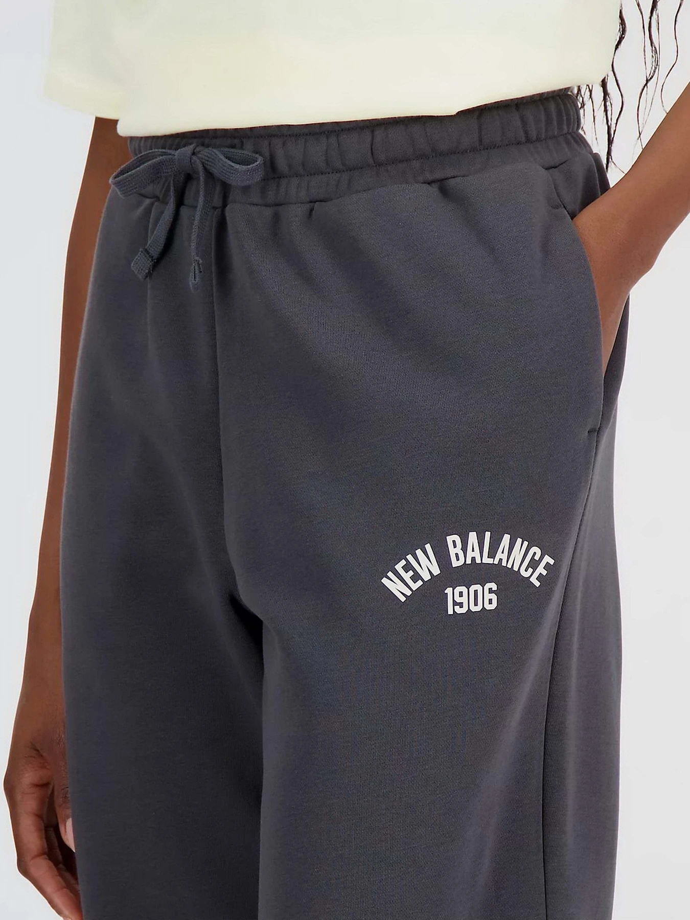 Брюки New Balance Essentials Varsity модель WP33551ACK Фото
