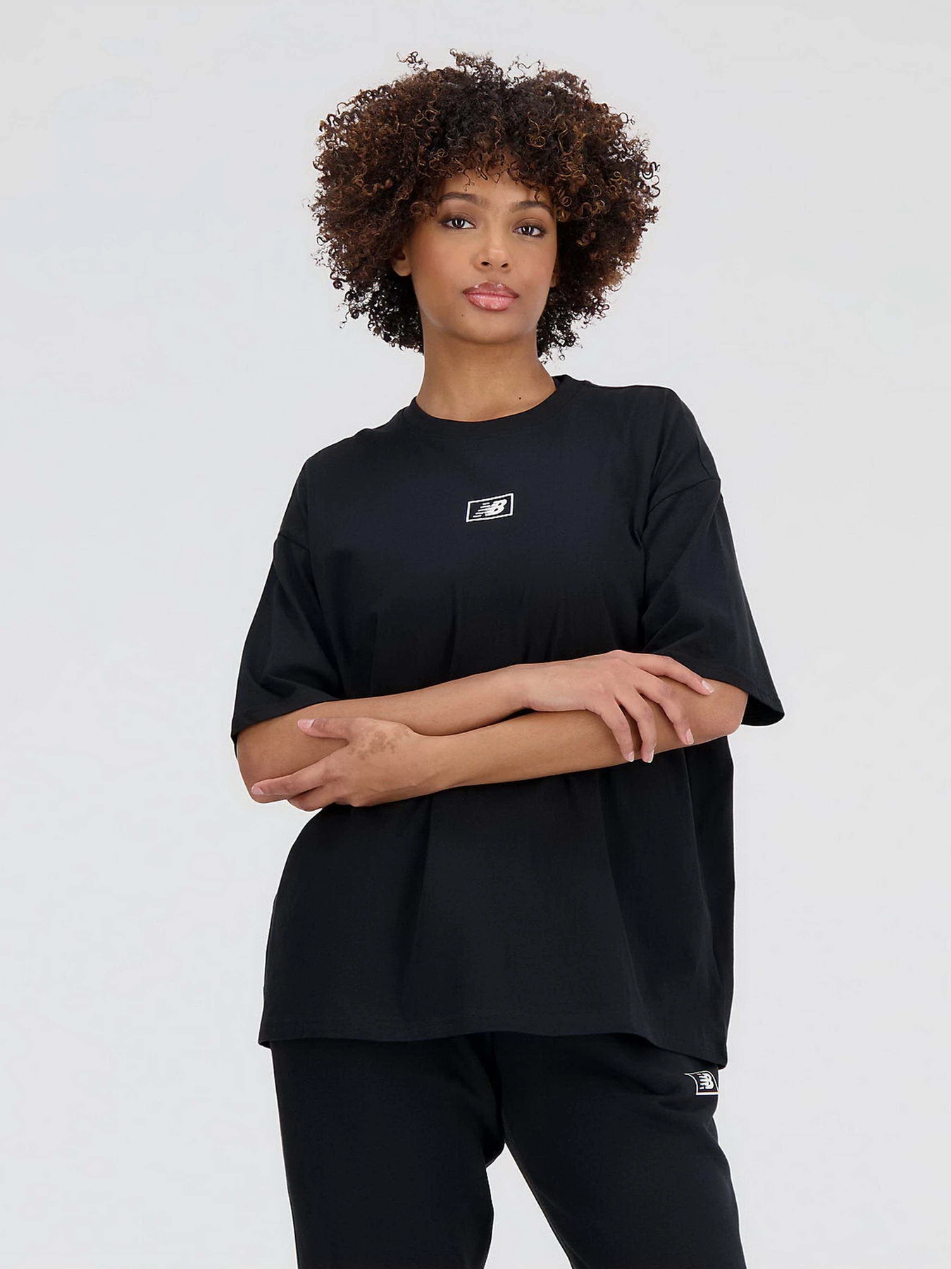 Футболки и поло New Balance Essentials Graphic модель WT33525BK Футболки и поло New Balance Essentials Graphic модель WT33525BK Фото
