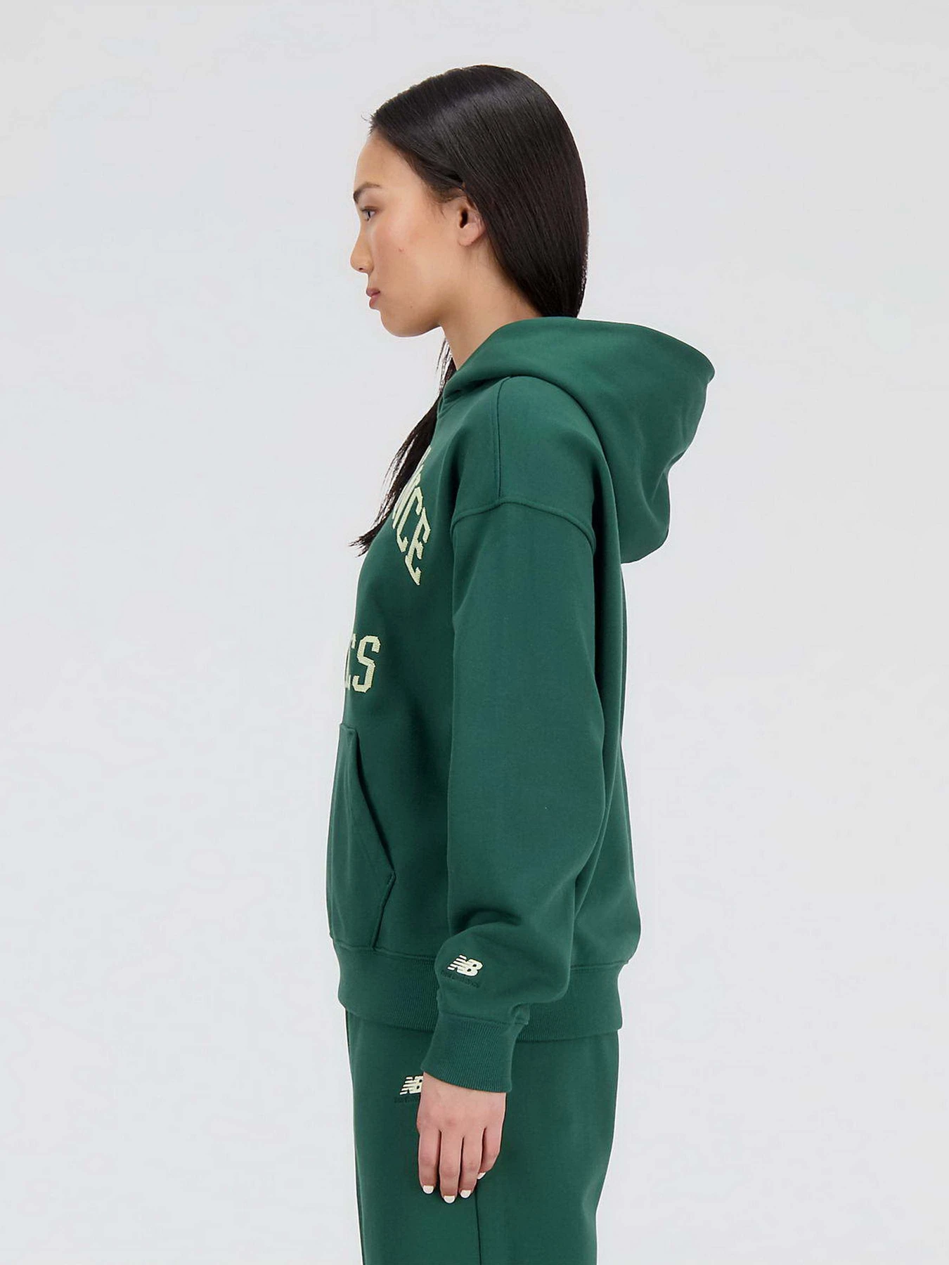 Худі та світшоти New Balance Athletics Varsity модель WT33550NWG Худі та світшоти New Balance Athletics Varsity модель WT33550NWG Фото