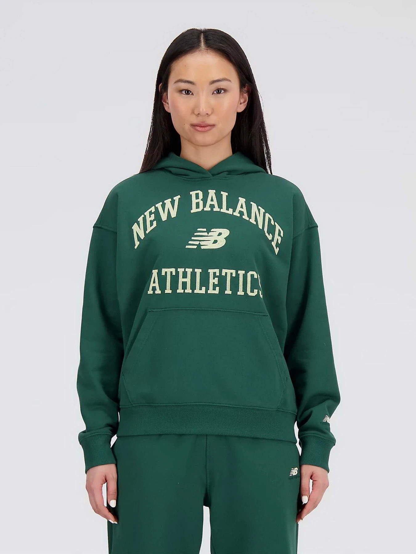 Худі та світшоти New Balance Athletics Varsity модель WT33550NWG Худі та світшоти New Balance Athletics Varsity модель WT33550NWG Фото