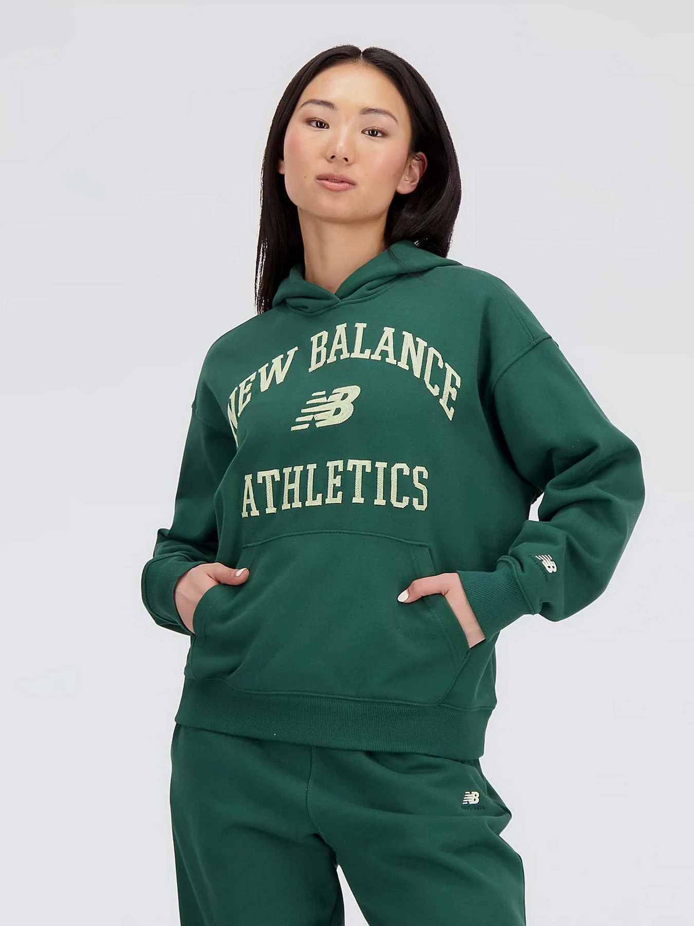 Худі та світшоти New Balance Athletics Varsity модель WT33550NWG Худі та світшоти New Balance Athletics Varsity модель WT33550NWG Фото