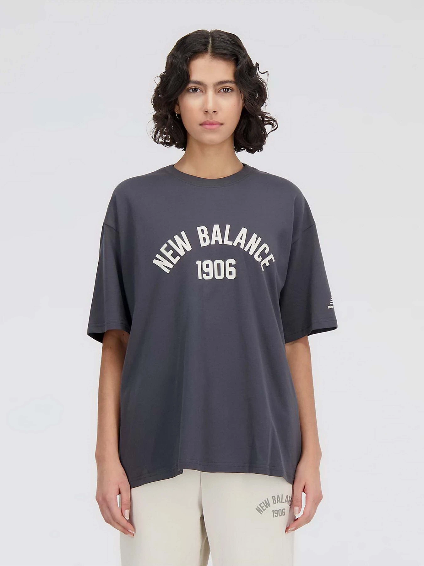 Футболки и поло New Balance Essentials Varsity модель WT33554ACK Футболки и поло New Balance Essentials Varsity модель WT33554ACK Фото