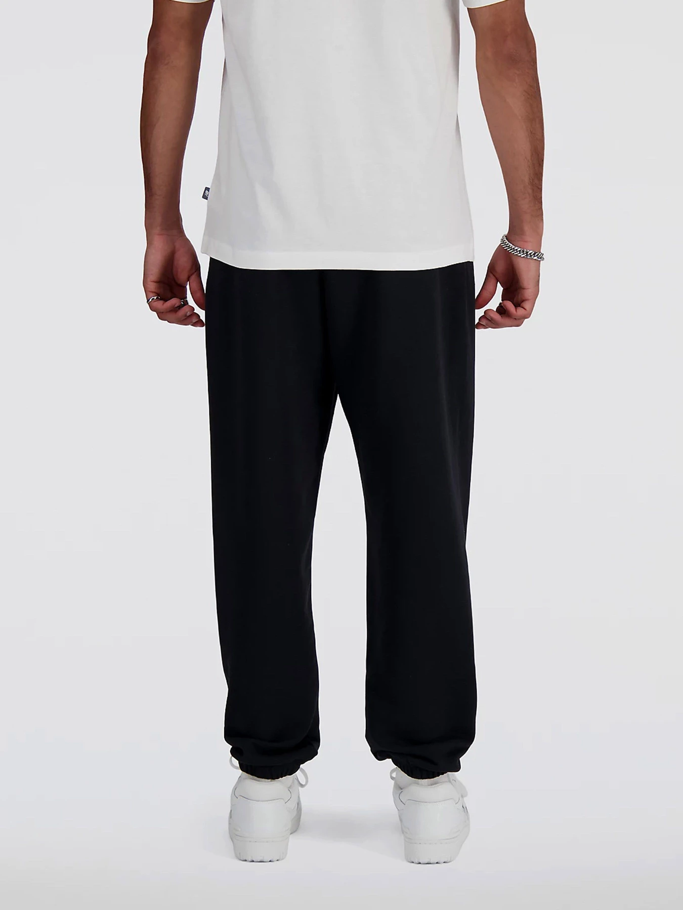 Штани New Balance SMALL LOGO модель MP41519BK Штани New Balance SMALL LOGO модель MP41519BK Фото