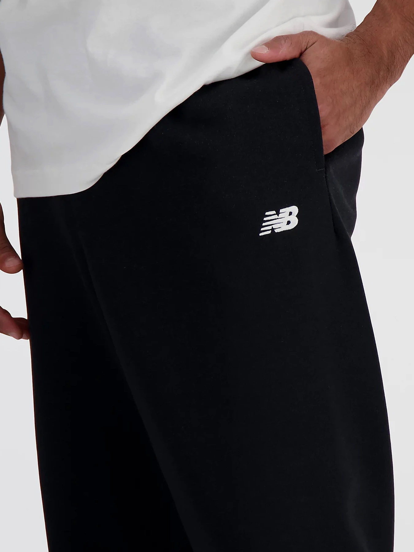 Штани New Balance SMALL LOGO модель MP41519BK Штани New Balance SMALL LOGO модель MP41519BK Фото