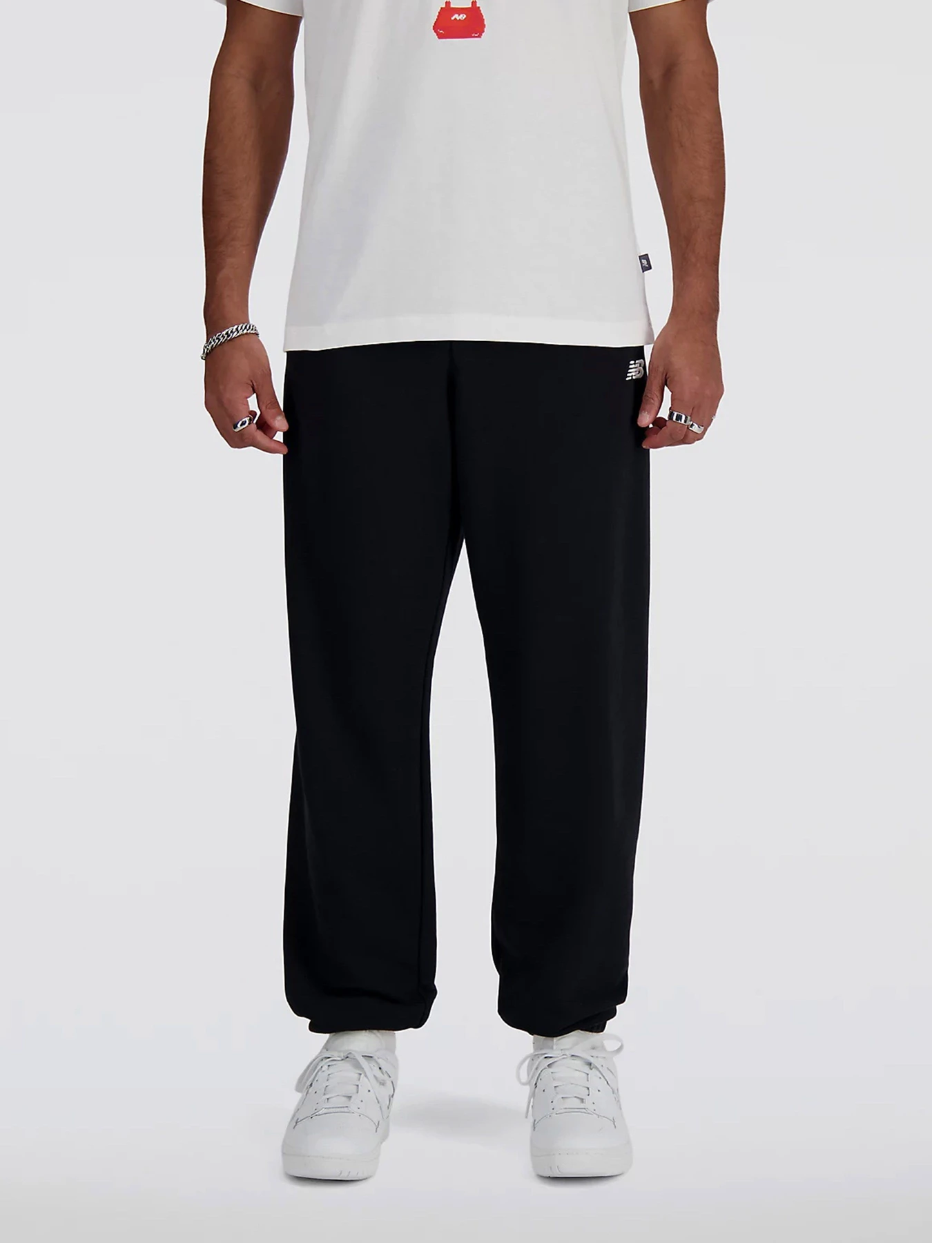 Штани New Balance SMALL LOGO модель MP41519BK Штани New Balance SMALL LOGO модель MP41519BK Фото