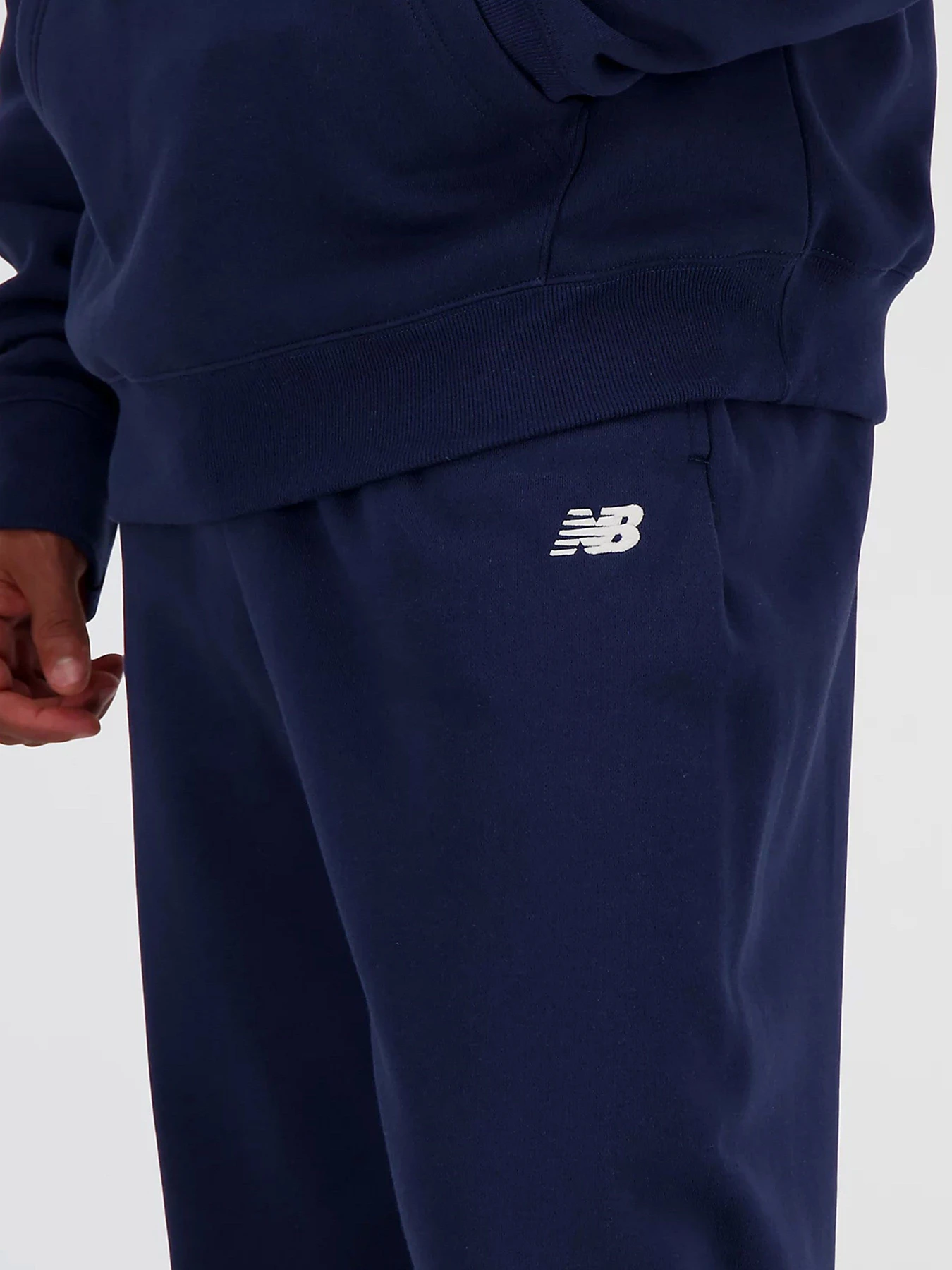 Штани New Balance SMALL LOGO модель MP41519NNY Штани New Balance SMALL LOGO модель MP41519NNY Фото