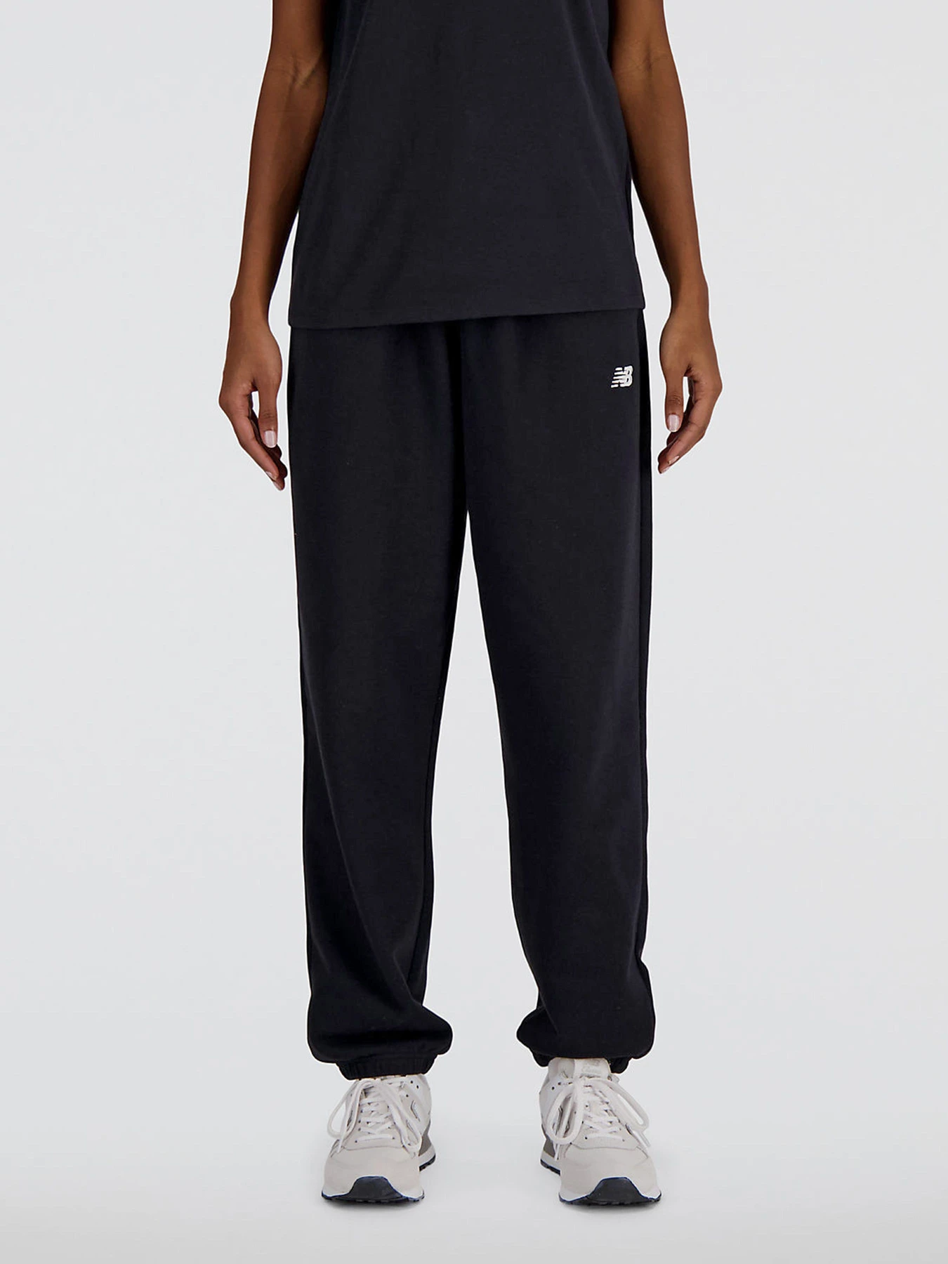 Штани New Balance SMALL LOGO модель WP41500BK Штани New Balance SMALL LOGO модель WP41500BK Фото