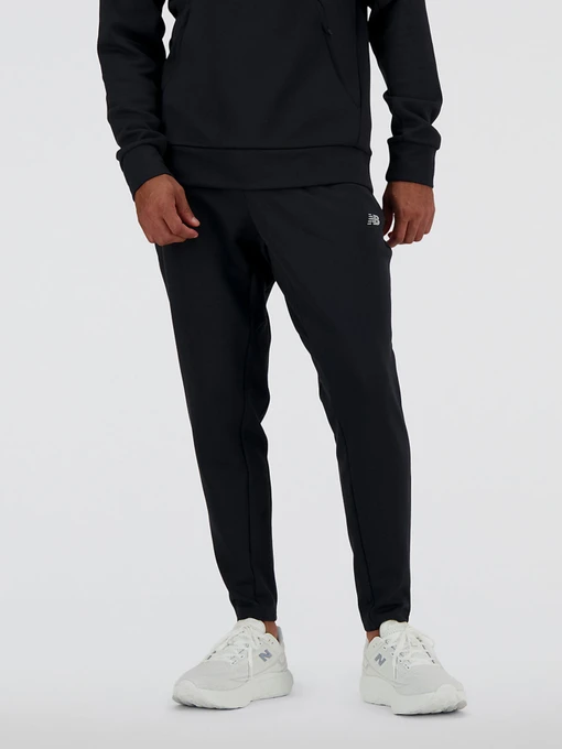 Штани New Balance TECH KNIT модель MP41143BK Фото