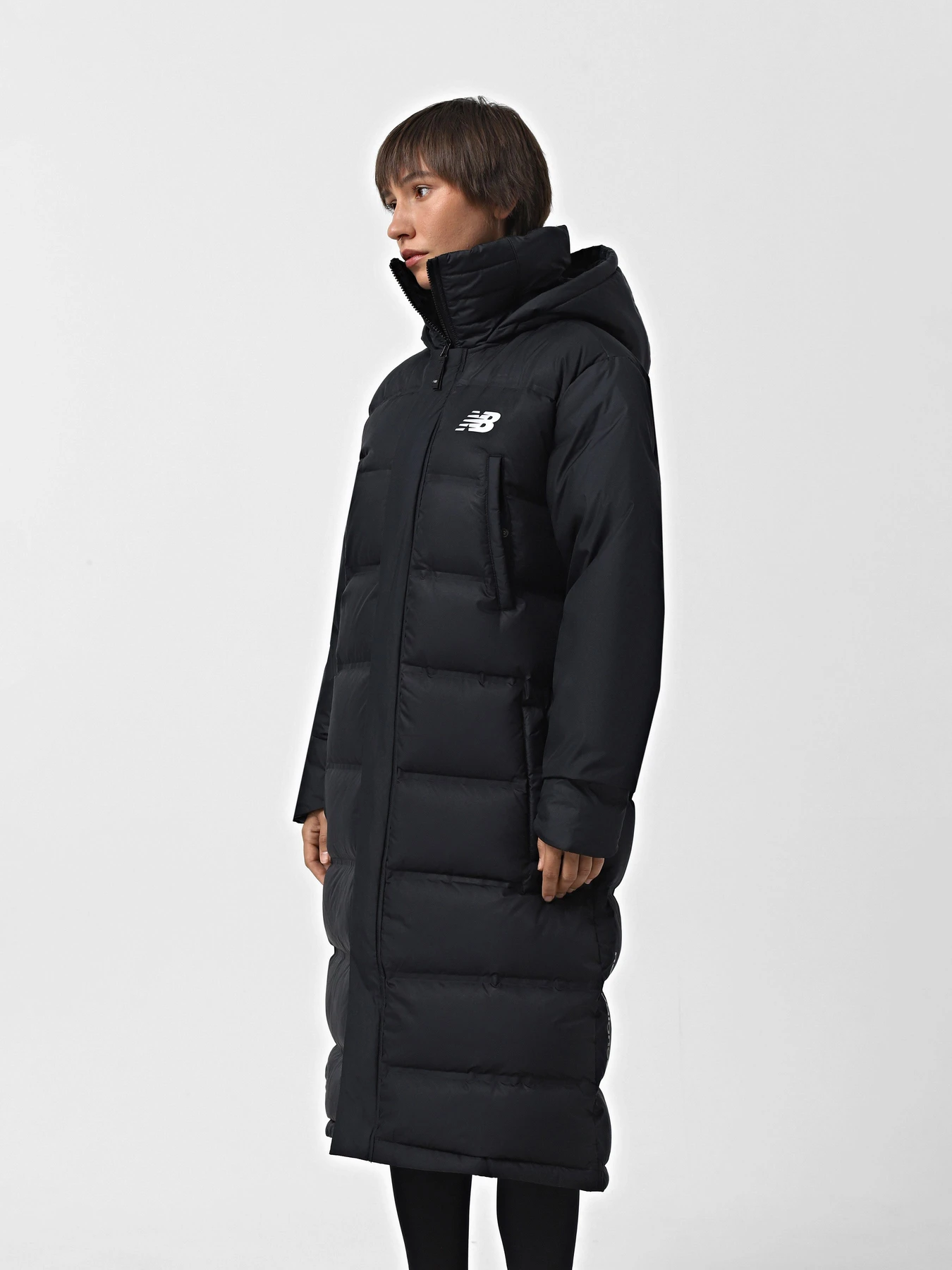Куртки и дубленки New Balance BENCH LONG DOWN модель MJ231054BK Куртки и дубленки New Balance BENCH LONG DOWN модель MJ231054BK Фото