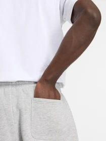 Брюки New Balance SPORT ESSENTIALS FLEECE модель MP41503AG Фото