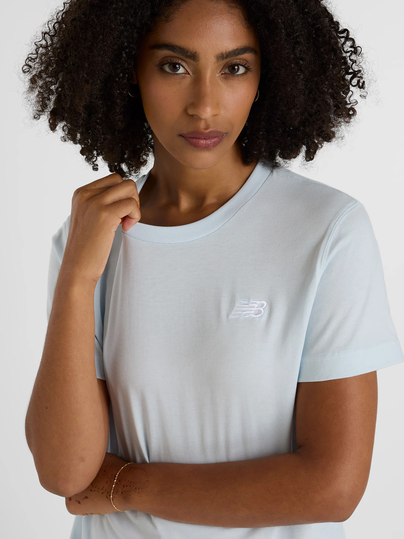 Футболки і поло New Balance SPORT ESSENTIALS JERSEY модель WT41509IB Футболки і поло New Balance SPORT ESSENTIALS JERSEY модель WT41509IB Фото