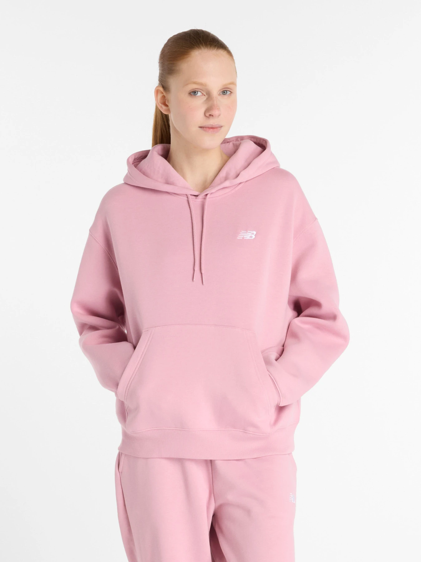 Худі та світшоти New Balance ESSENTIALS модель WT41510PTF Худі та світшоти New Balance ESSENTIALS модель WT41510PTF Фото