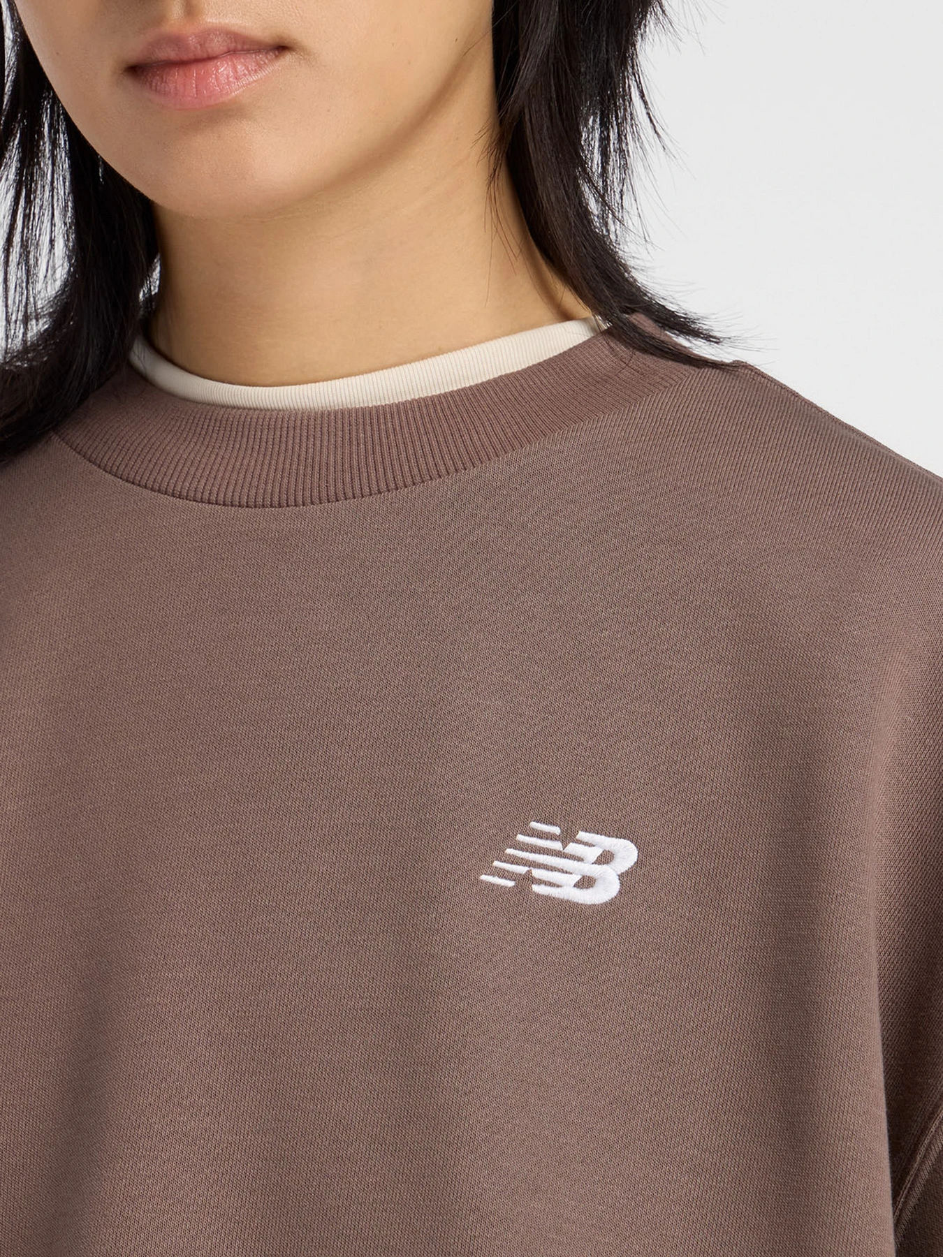 Худі та світшоти New Balance SPORT ESSENTIALS FRENCH TERRY модель WT41508ABP Худі та світшоти New Balance SPORT ESSENTIALS FRENCH TERRY модель WT41508ABP Фото