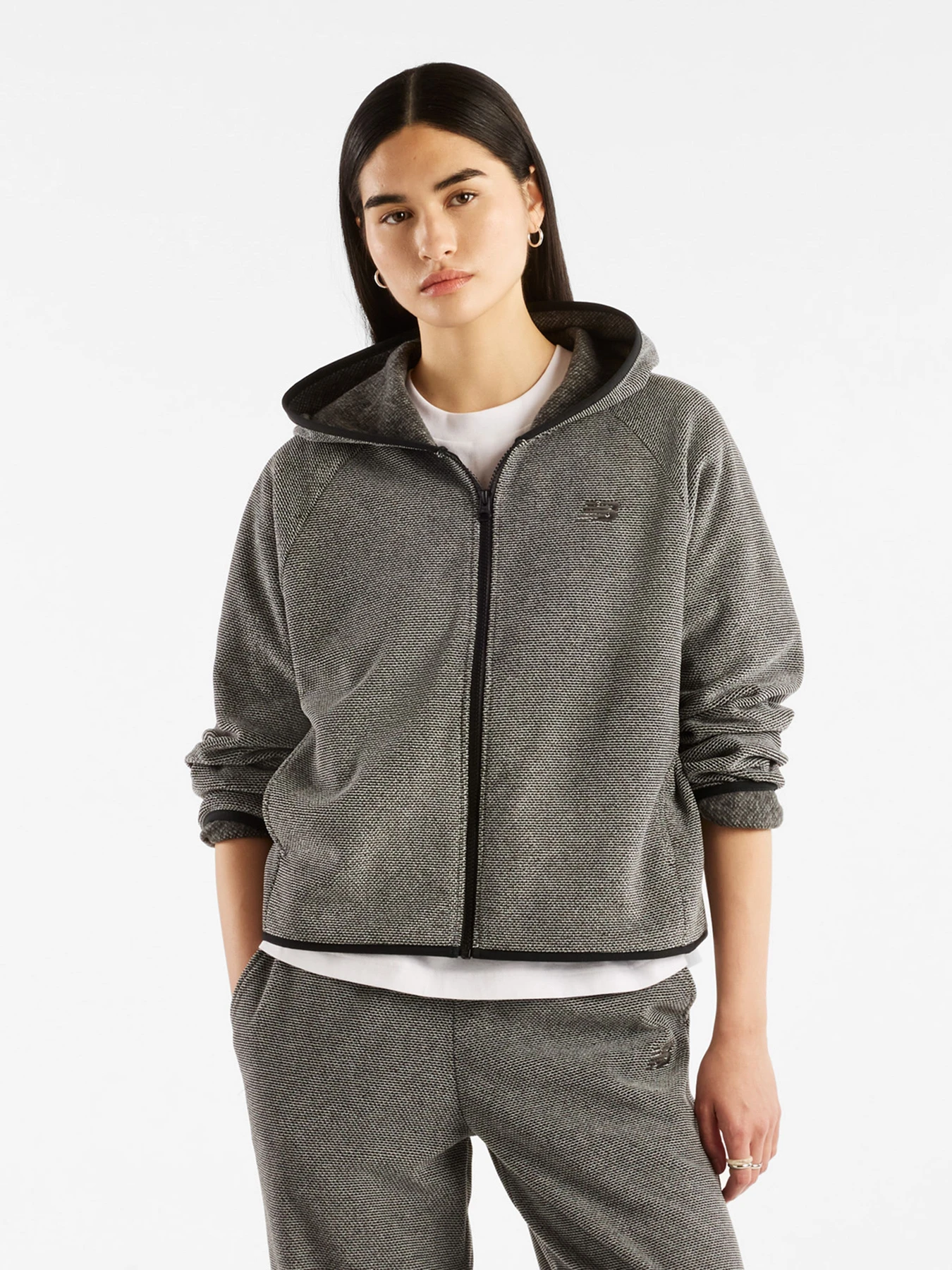 Худі та світшоти New Balance TEXTURED FLEECE модель WJ62V29LBK Худі та світшоти New Balance TEXTURED FLEECE модель WJ62V29LBK Фото