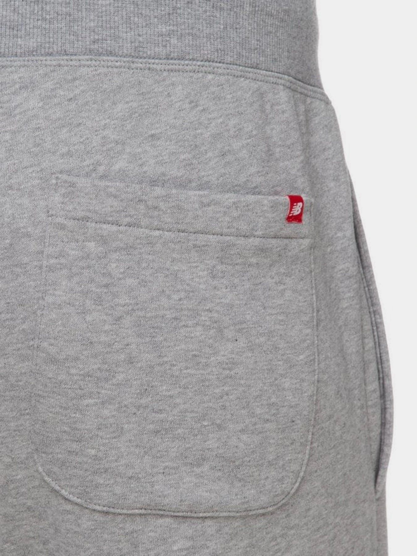 Брюки New Balance Essentials Stacked Logo модель MP03558AG Брюки New Balance Essentials Stacked Logo модель MP03558AG Фото
